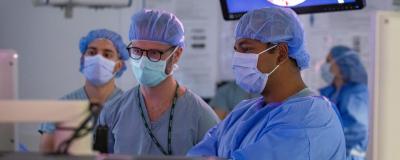 Stephen Munich, MD, in the operating room
