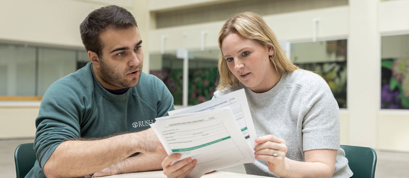 A Rush nurse mentors a new member of the nursing team