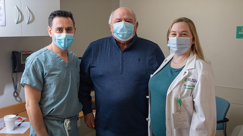 Rick Kingsnorth (center) surrounded by his care team (left to right) Sepehr Sani, MD, and Fiona Lynn, NP