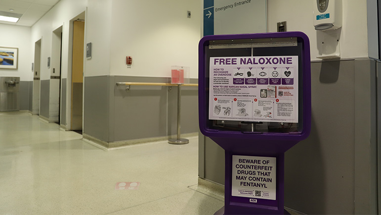 narcan newsstand positioned in the hallway within rush's emergency department