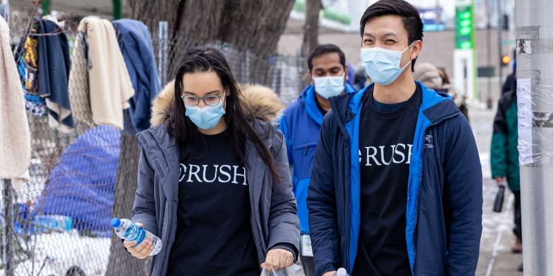Rush volunteers helping people experiencing homelessness