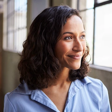 A woman smiling