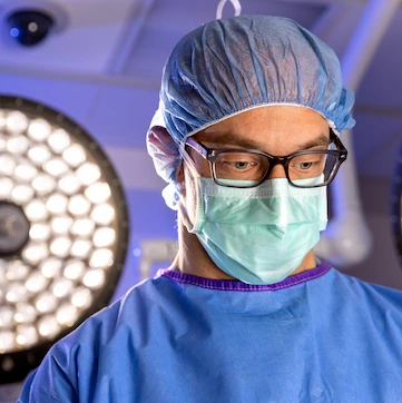 Thoracic surgeon in an operating room