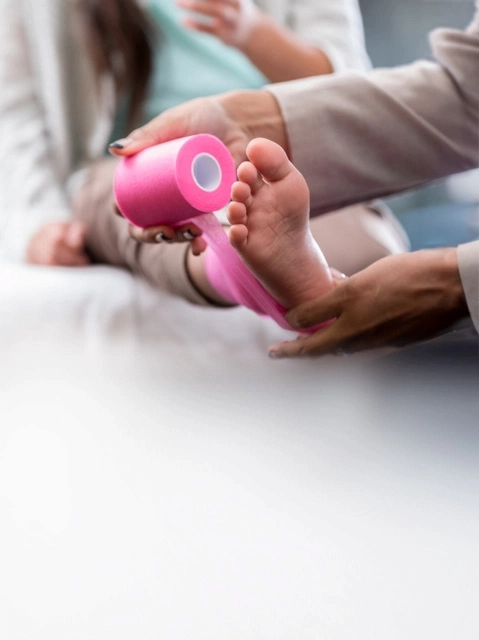 A patient getting her foot wrapped