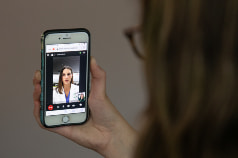 A patient using telemedicine for an appointment