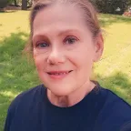 Photo of Ellen, who underwent back surgery, in her back yard