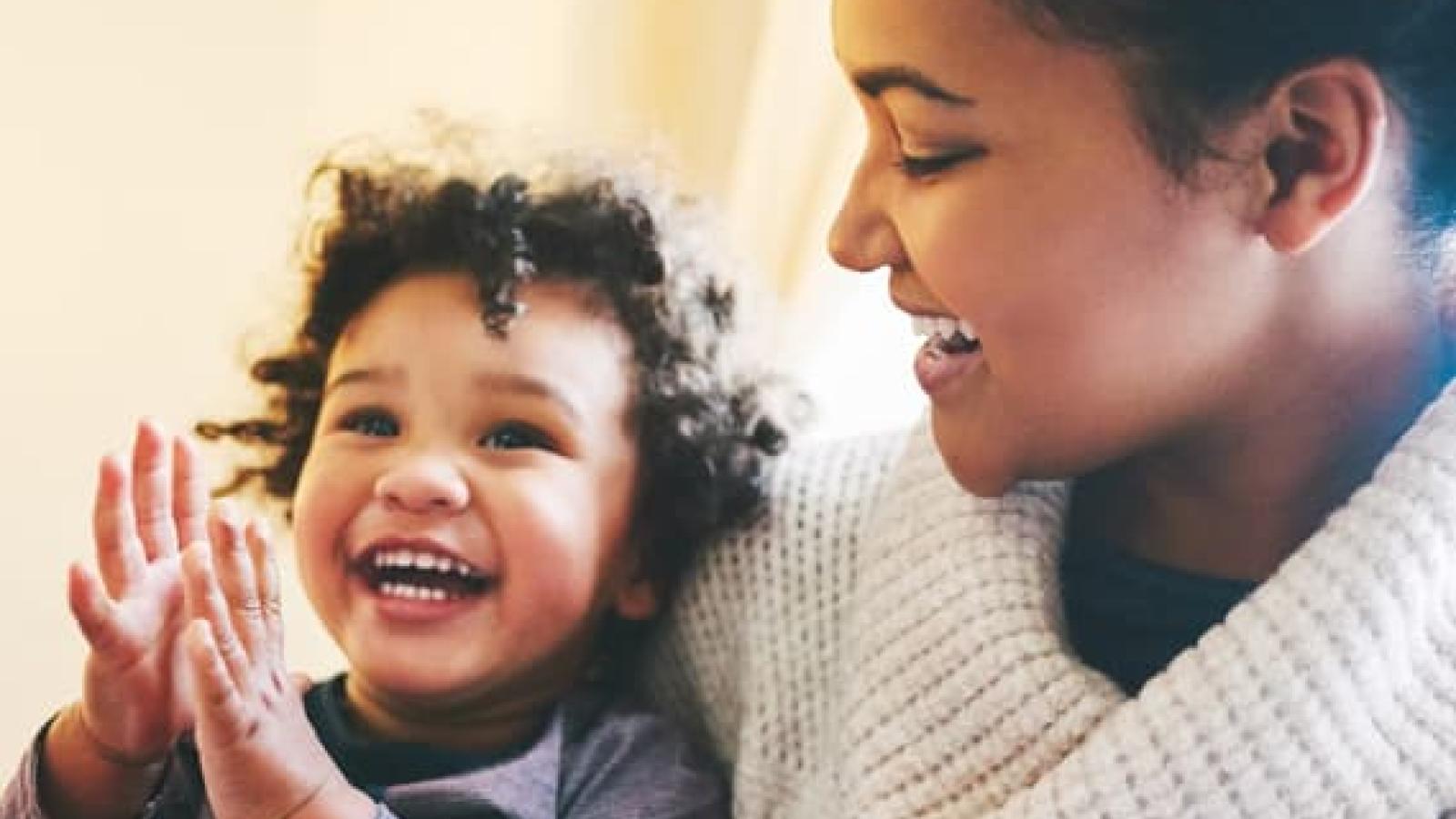 A mom holding an infant