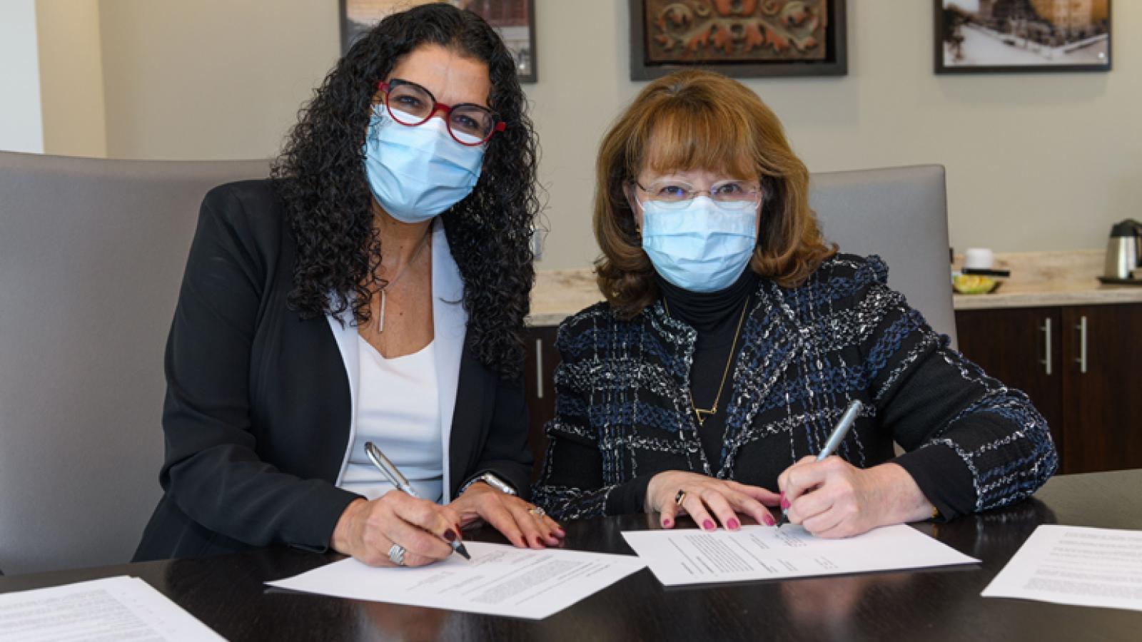 Salma Ghanem, PhD, DePaul University, and Susan Freeman, MD, Provost of Rush University