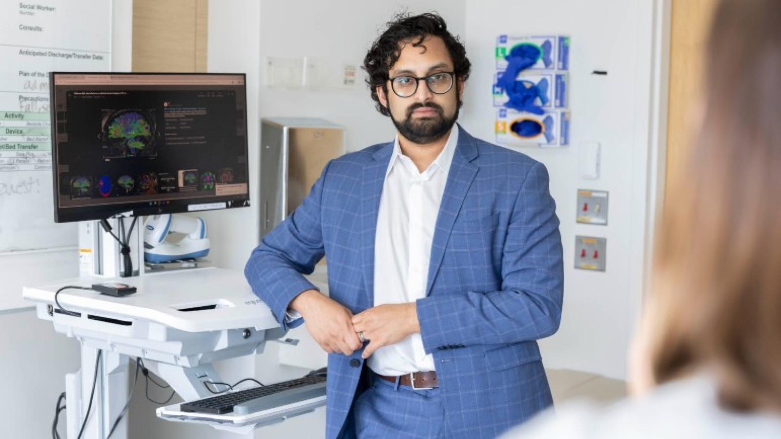 Arka Mallela, MD, MS, assistant professor, Department of Neurological Surgery, explains brain mapping