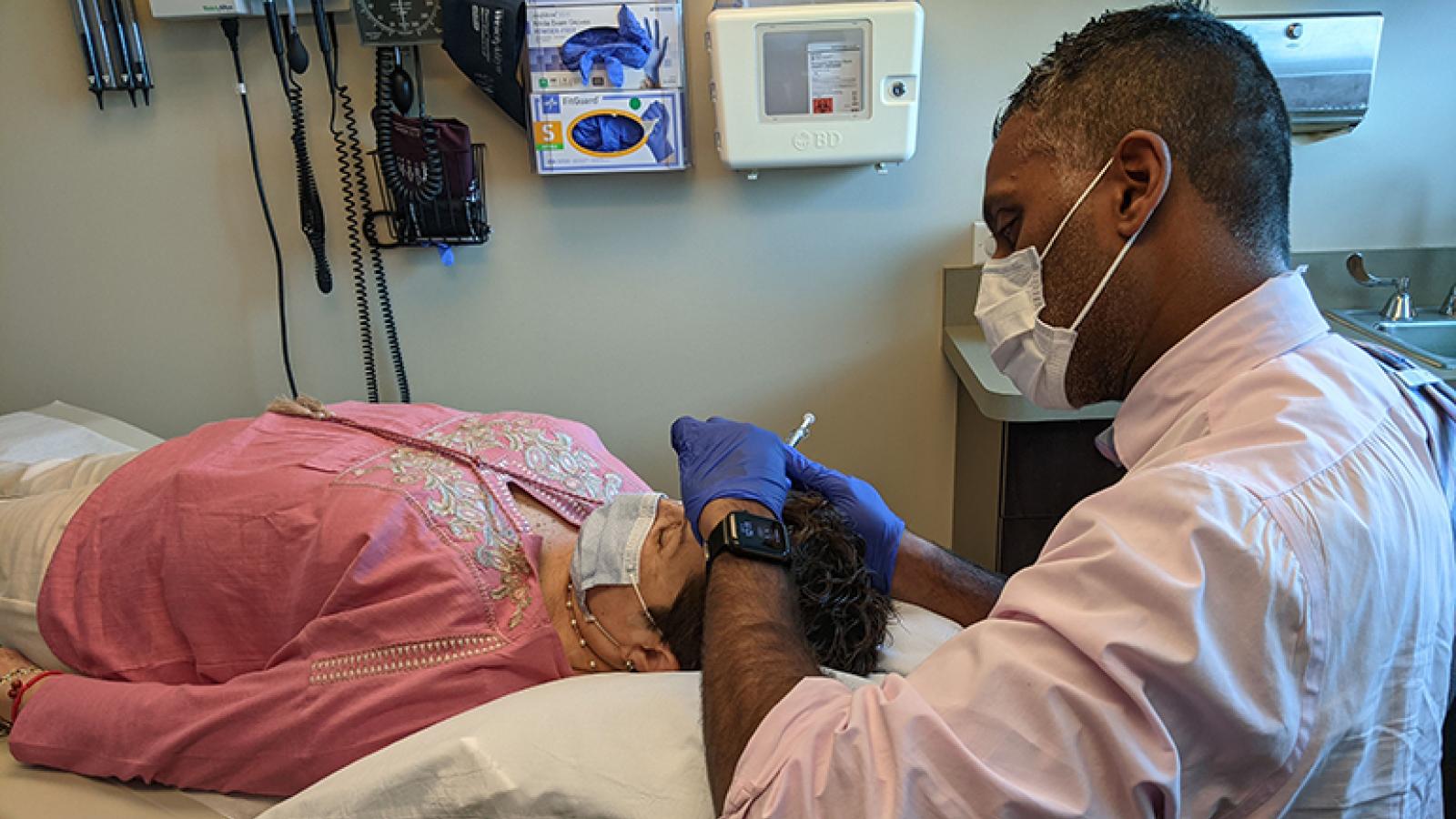 Pati Araujo-Drzewiecki receives botox treatment from Saju Abraham, MD