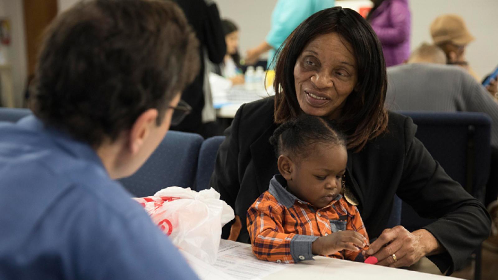 Patient and provider at church health event