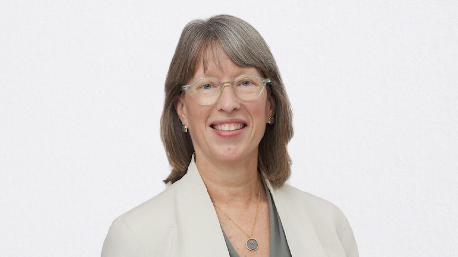 A headshot on a blank background featuring Jeannifer W. Steans.
