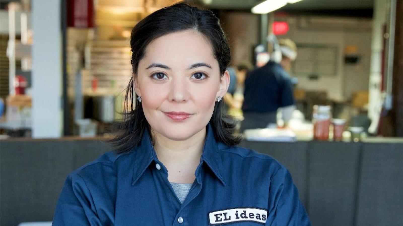 Akiko Moorman wearing a uniform shirt from EL ideas