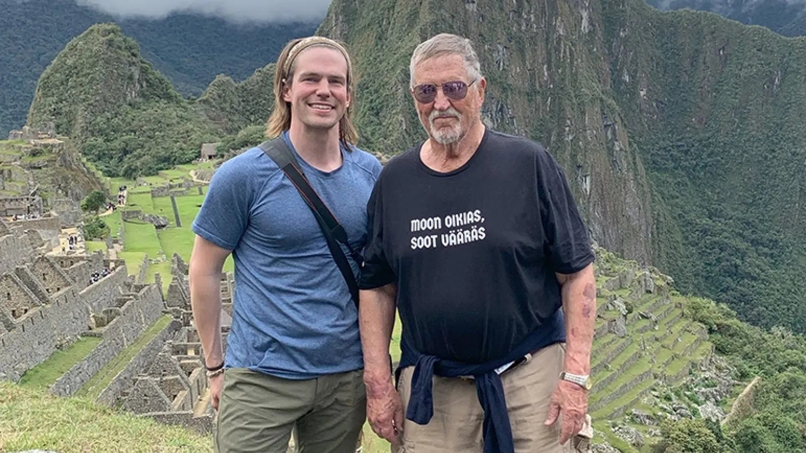 Antti Talvitie with son at Machu Picchu