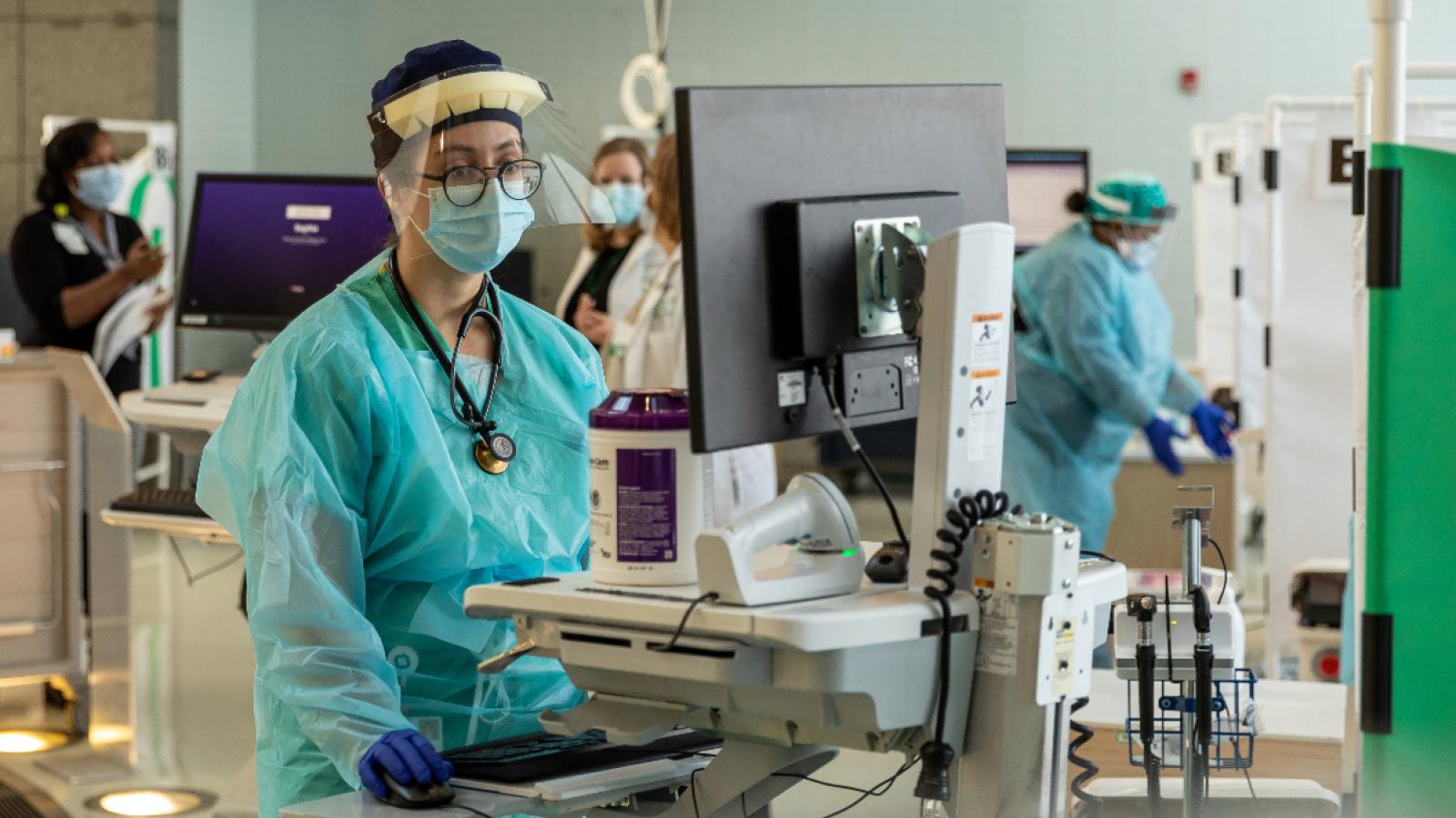 RUSH staff working in COVID-19 clinical space