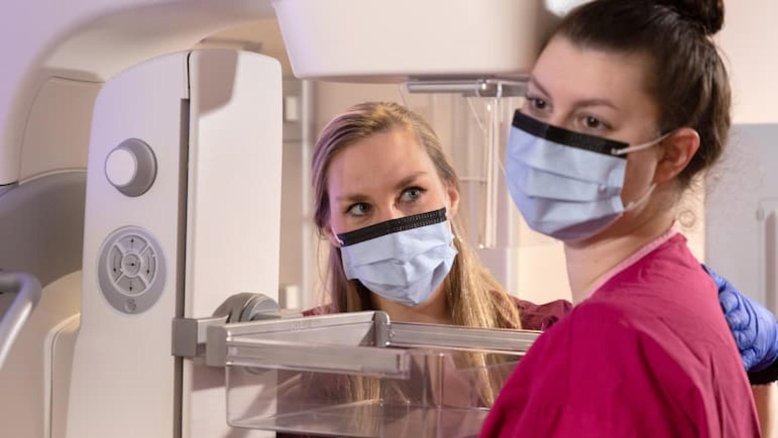 RUSH patient receiving a mammogram