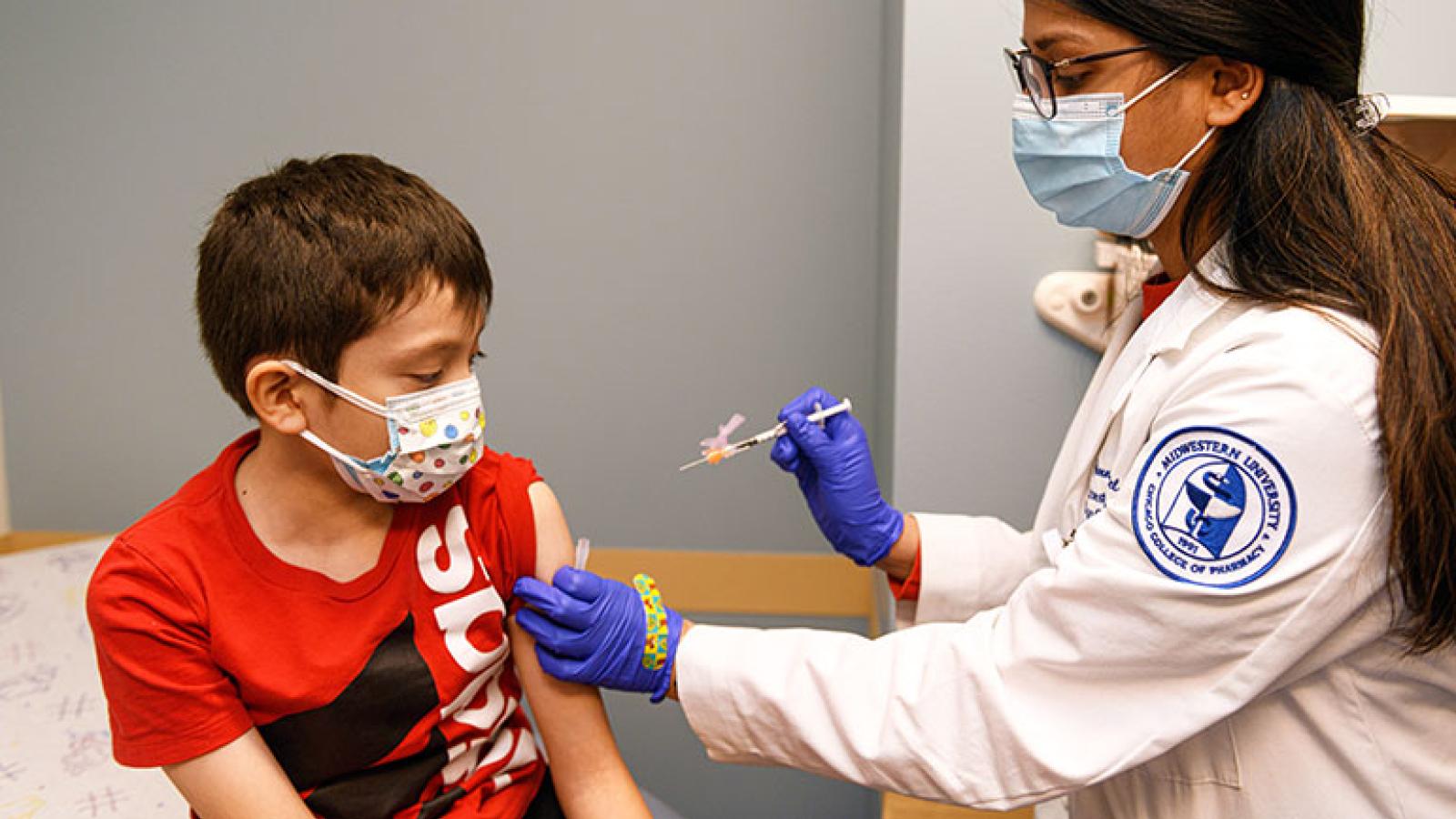 Child getting COVID shot