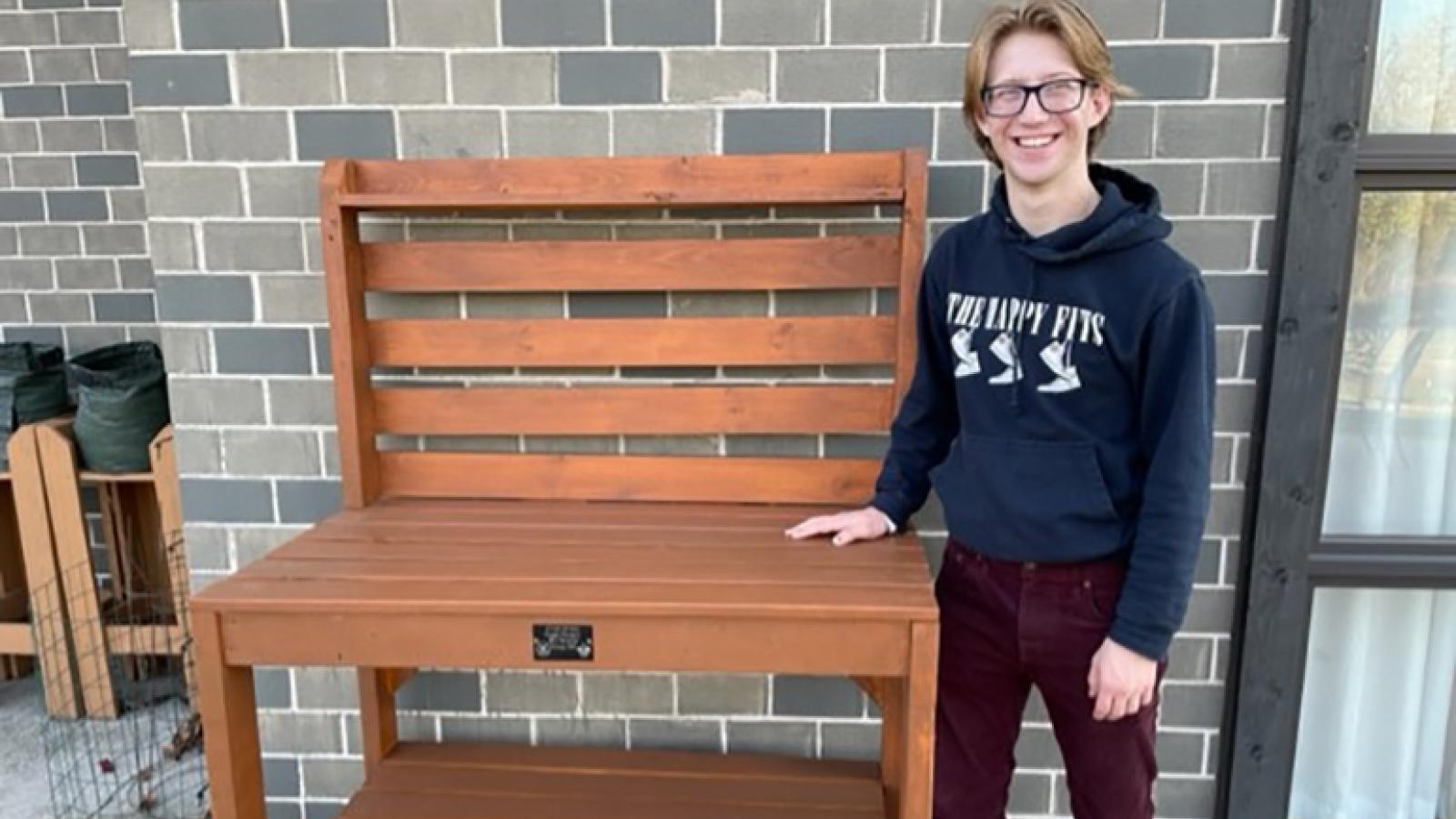 Boy Scout Colin Irvine and the gardening work bench 
