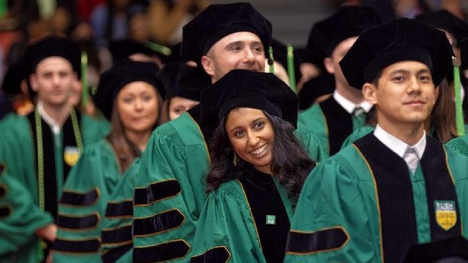 Graduates in regalia at Commencement