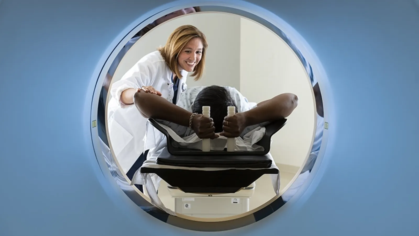 CT scan machine with patient and care provider