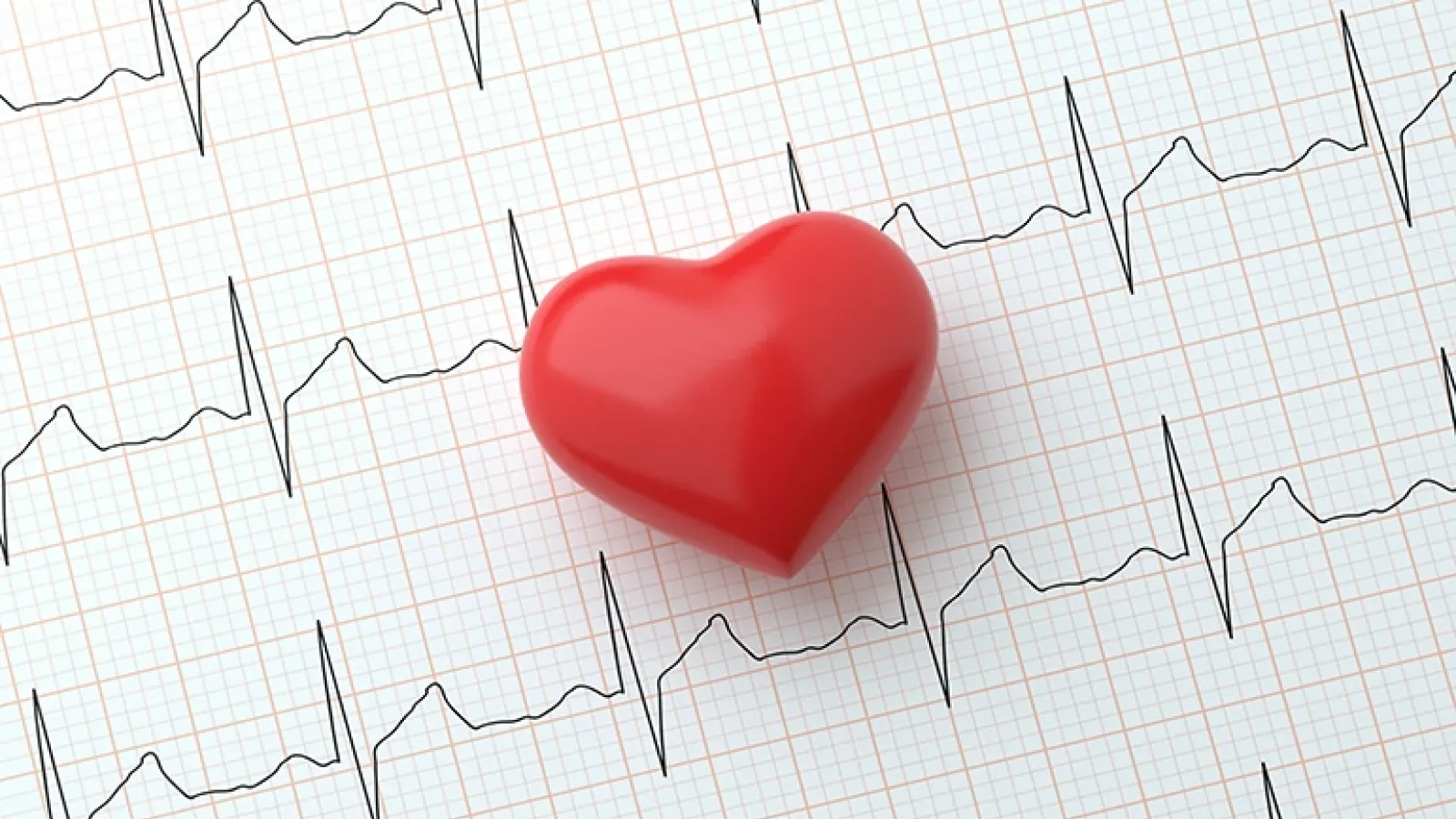 Heart symbol on top of an electrocardiogram readout