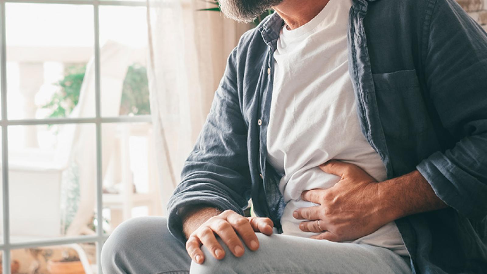 Man holding his stomach