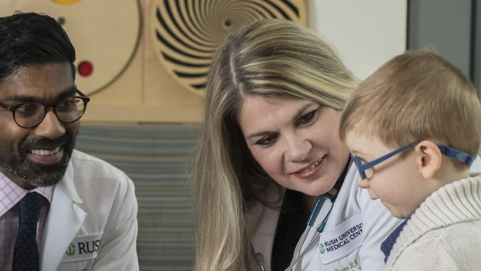 Dr. Kesavan with a patient