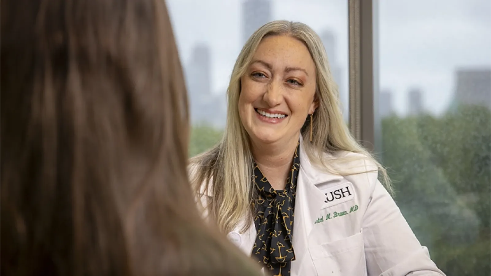 ENT specialist Kristal Brown, MD, with patient