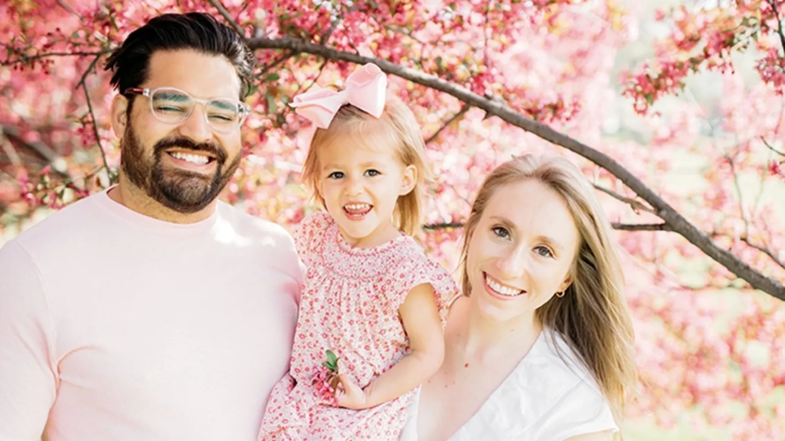 Father, mother and little girl