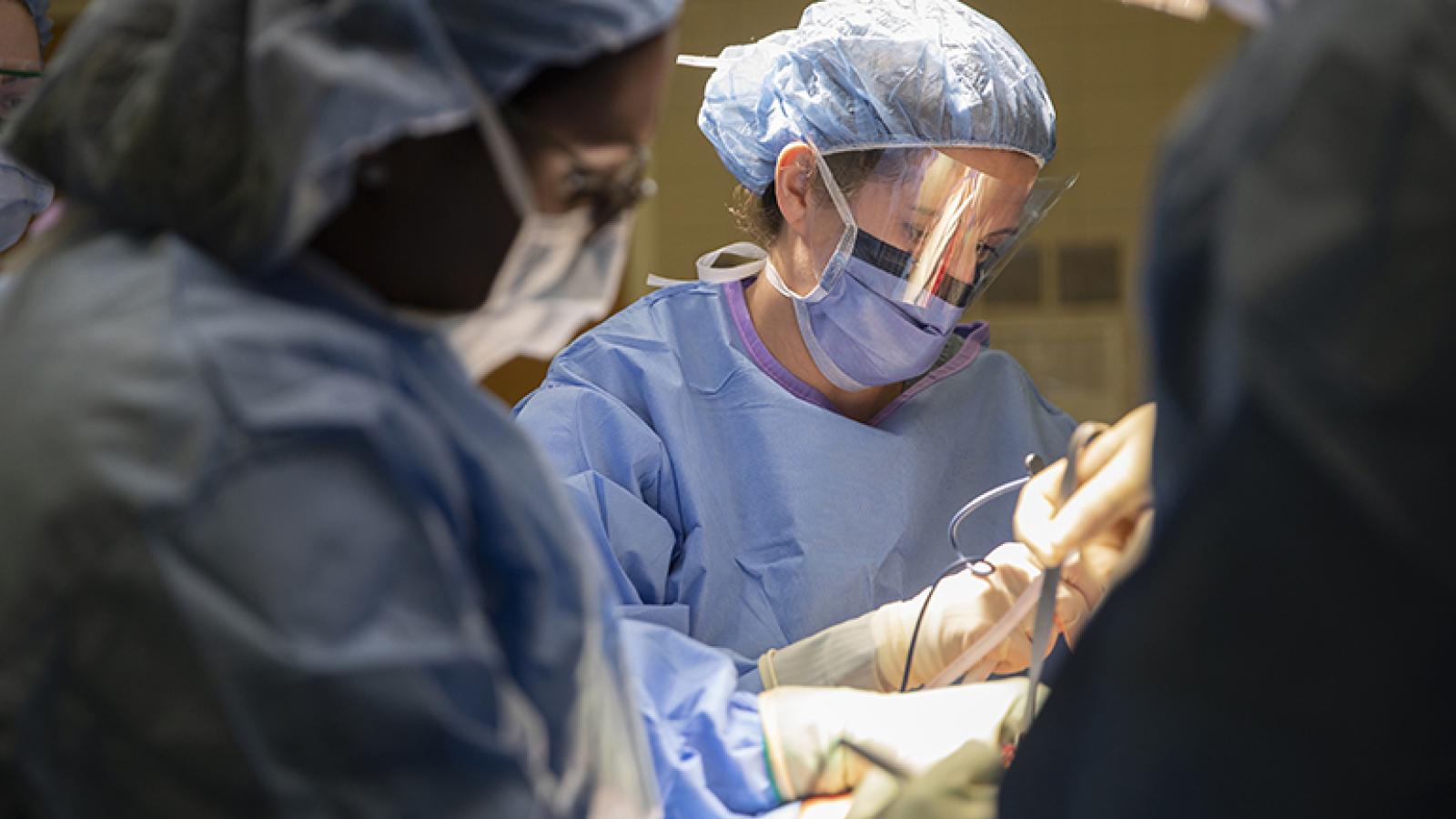 Surgeons perform an operation