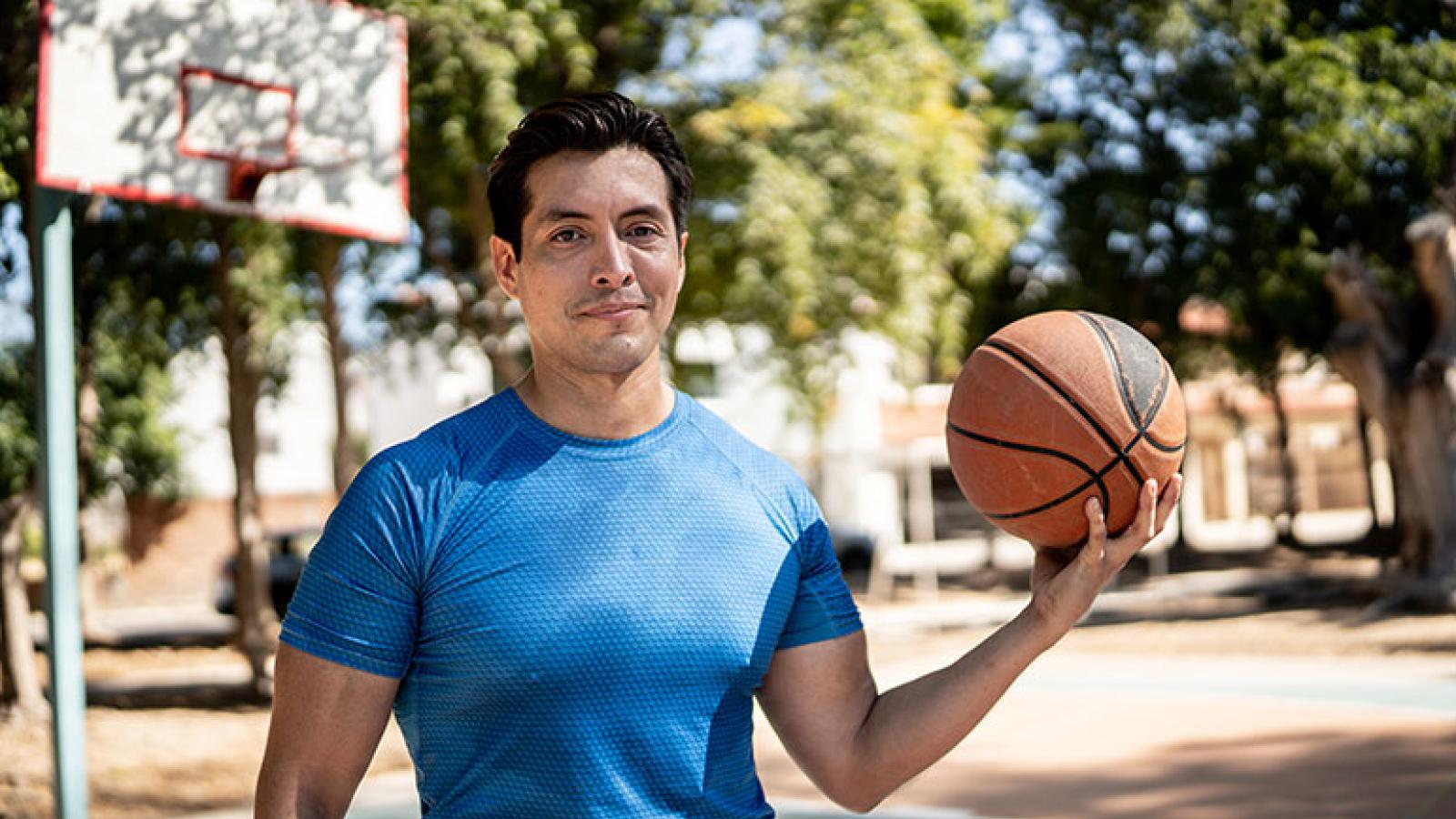 Man playing basketball
