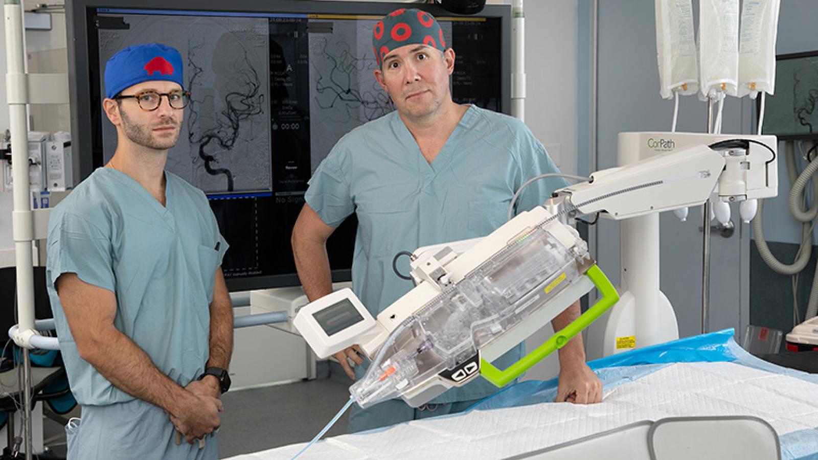 Stephan Munich and R. Webster Crowley with CorPath robot