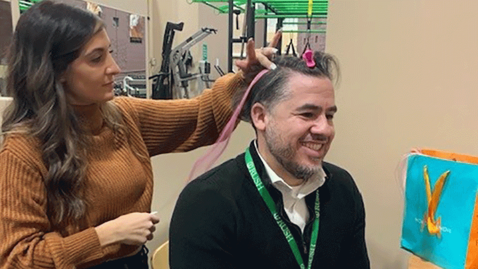 Omar Ramos, program development and operations manager at Waterford Place, got a pink strand in his hair to help raise funds for Waterford Place and awareness of breast cancer.
