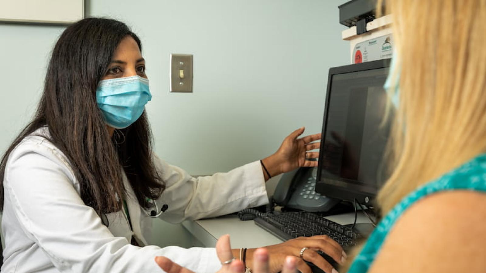 Dr. Rao with a patient
