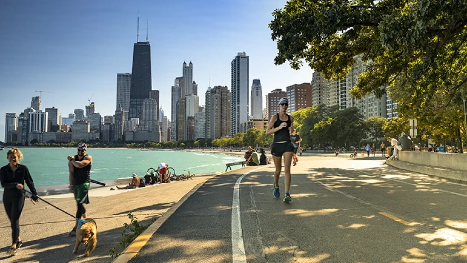 Woman running on lakefront path in Chicago