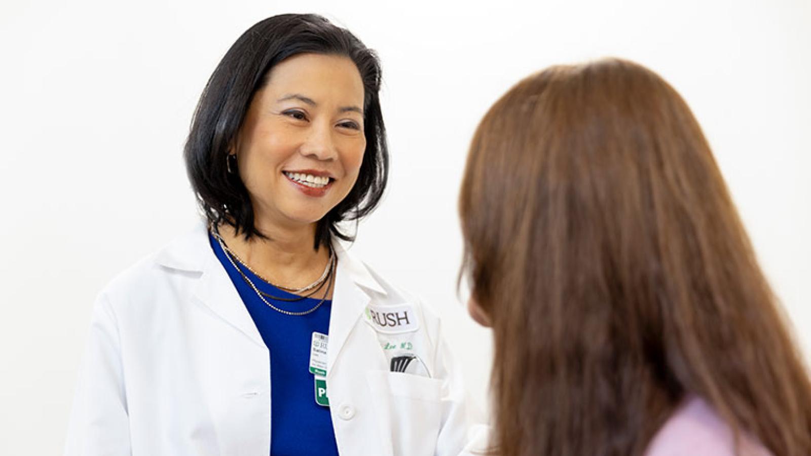 Salina Lee talking to a patient