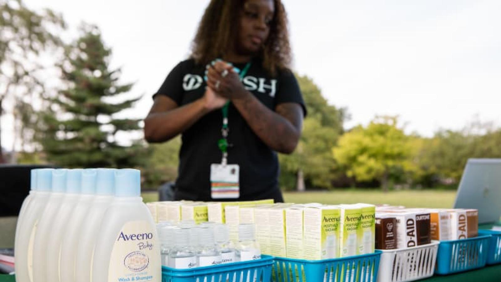 Rush social worker at a school-based health center event