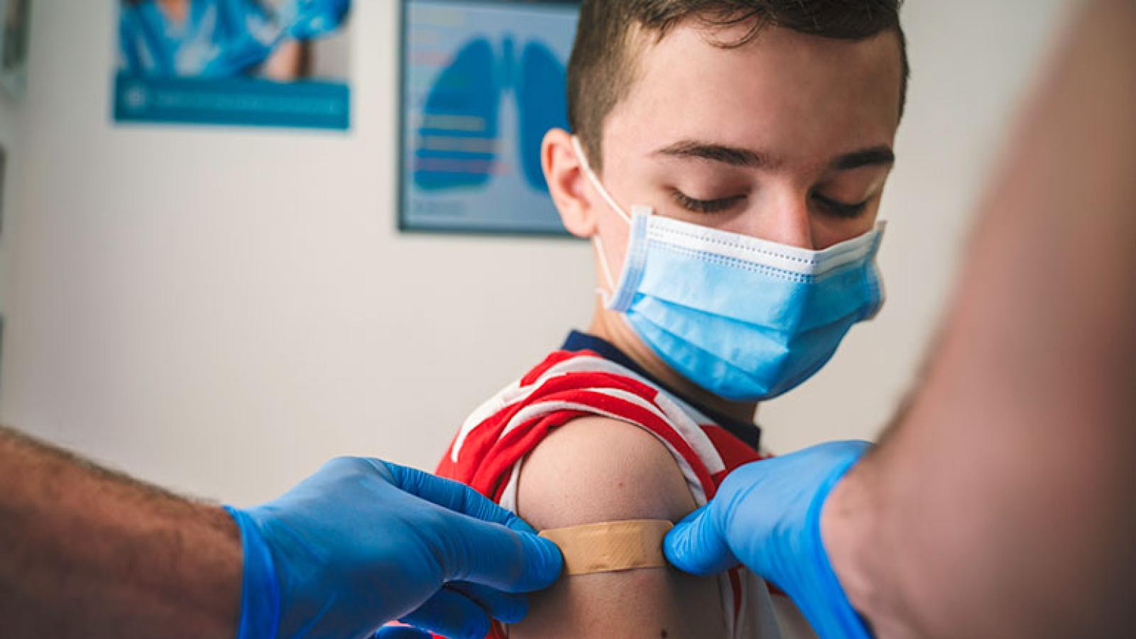 Boy getting vaccinated