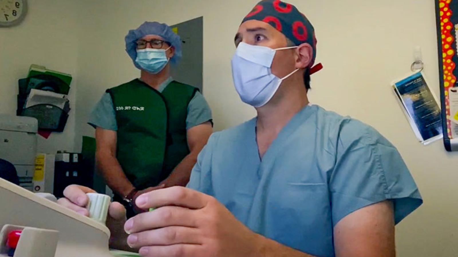 R. Webster Crowley using robotic technology