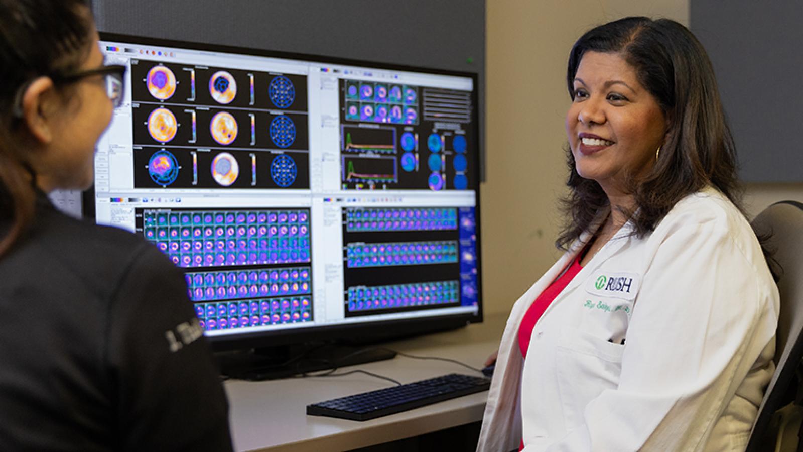 Rupa Sanghani with PET heart scan images