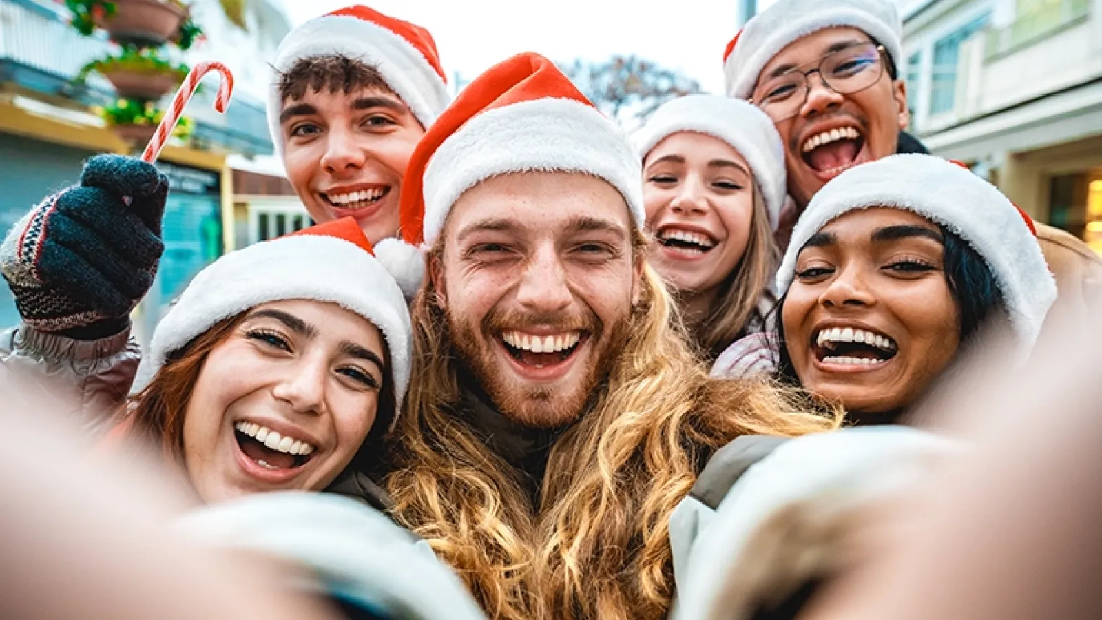 Young people taking a holiday selfie