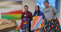 Aurora University students donate handmade blankets to Waterford Place Cancer Resource Center