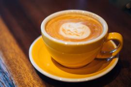 Cup of Pumpkin Spice Latte With Pumpkin Decoration 