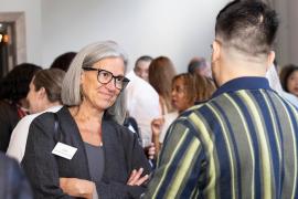 Julie Anne Hoff, PhD, RN, FNAP, FAAN, provost and senior vice president of Rush University, talks to someone at an event.
