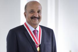 Dr. Ranga Krishnan wearing his Honorary Citizen Award medallion