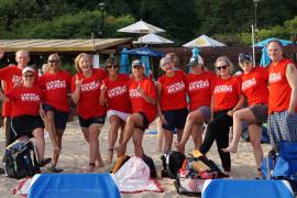 Ellen Bintz Meuch and her Swim Across America team gather for a photo