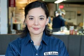 Akiko Moorman wearing a uniform shirt from EL ideas