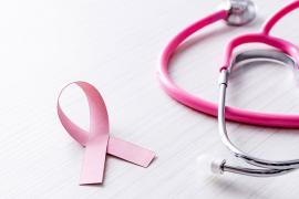 Breast cancer awareness ribbon and stethoscope