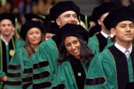 Graduates in regalia at Commencement