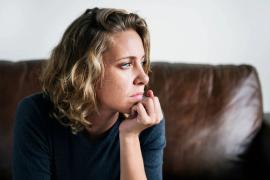 Woman looking distressed. 